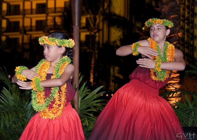 Young girls perform the Hawaiian hula